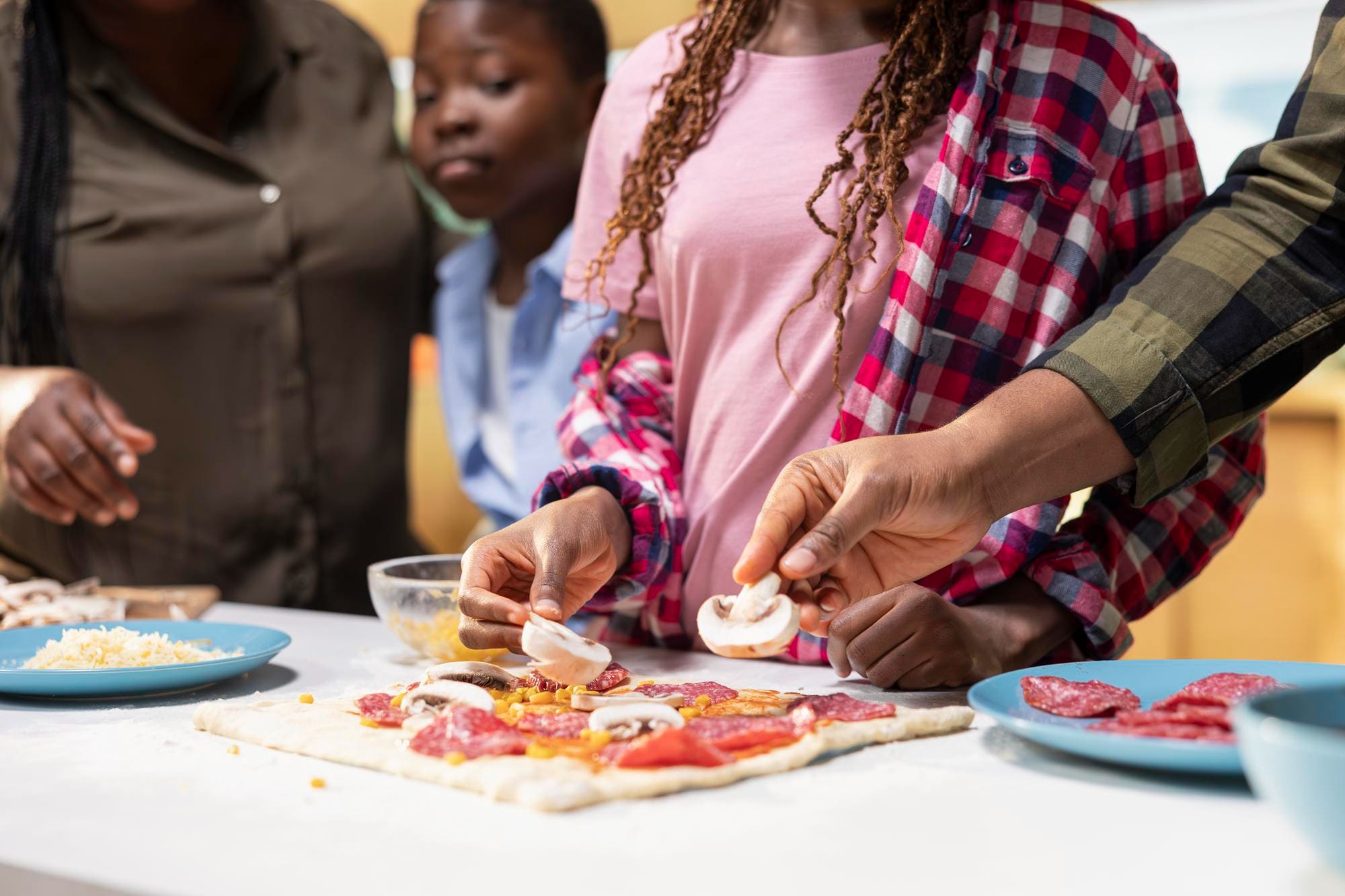 Young people preparing food together